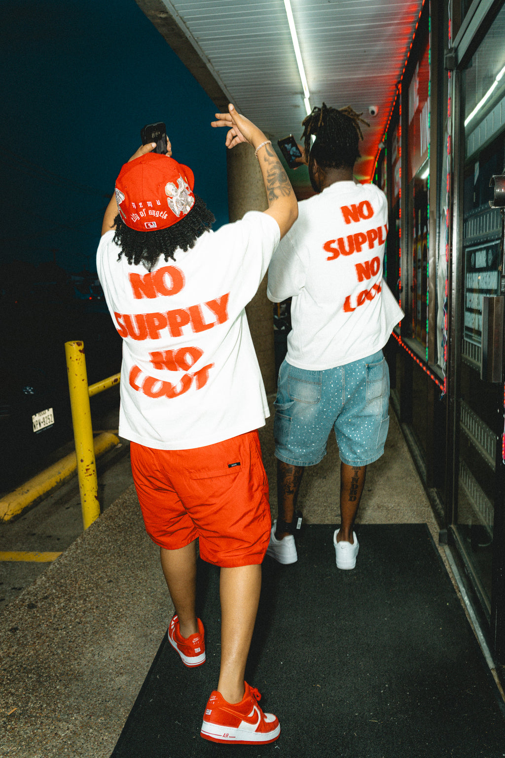 oversized white streetwear tee "no supply no loot"
