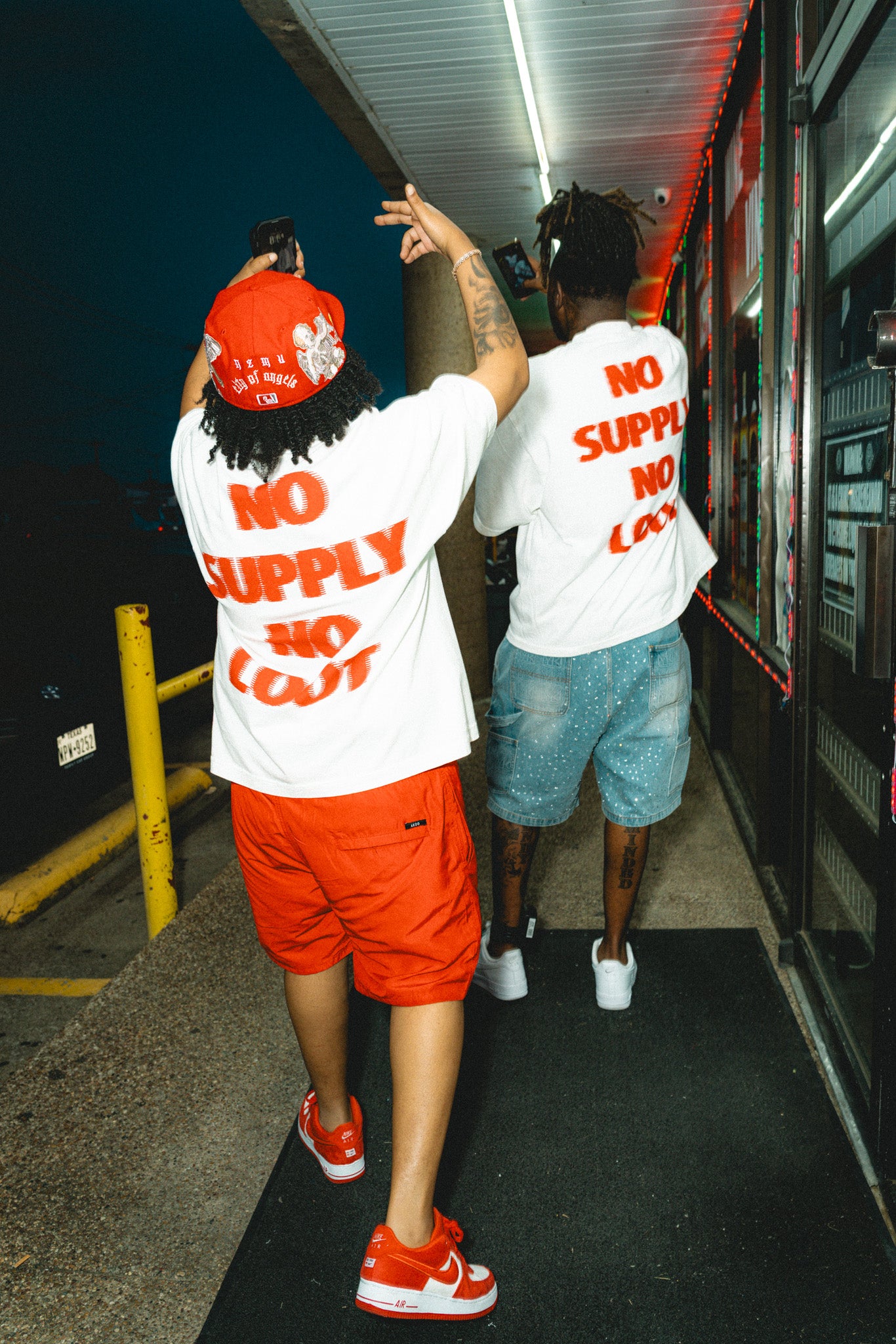 oversized white streetwear tee "no supply no loot"